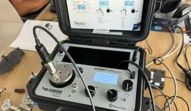 Visual example of poor weight distribution with off-centered mass on a shaker table