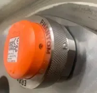 PHANTOM® wireless vibration sensor by ERBESSD INSTRUMENTS® installed on industrial machinery by CBM Partners