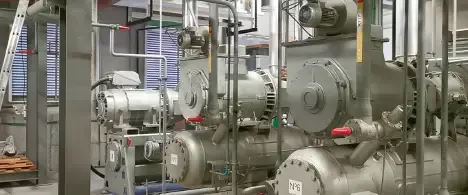 Industrial refrigeration compressor showing wear on critical components due to undetected resonance