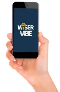 Hand holding a smartphone running the WiSER VIBE® condition monitoring app