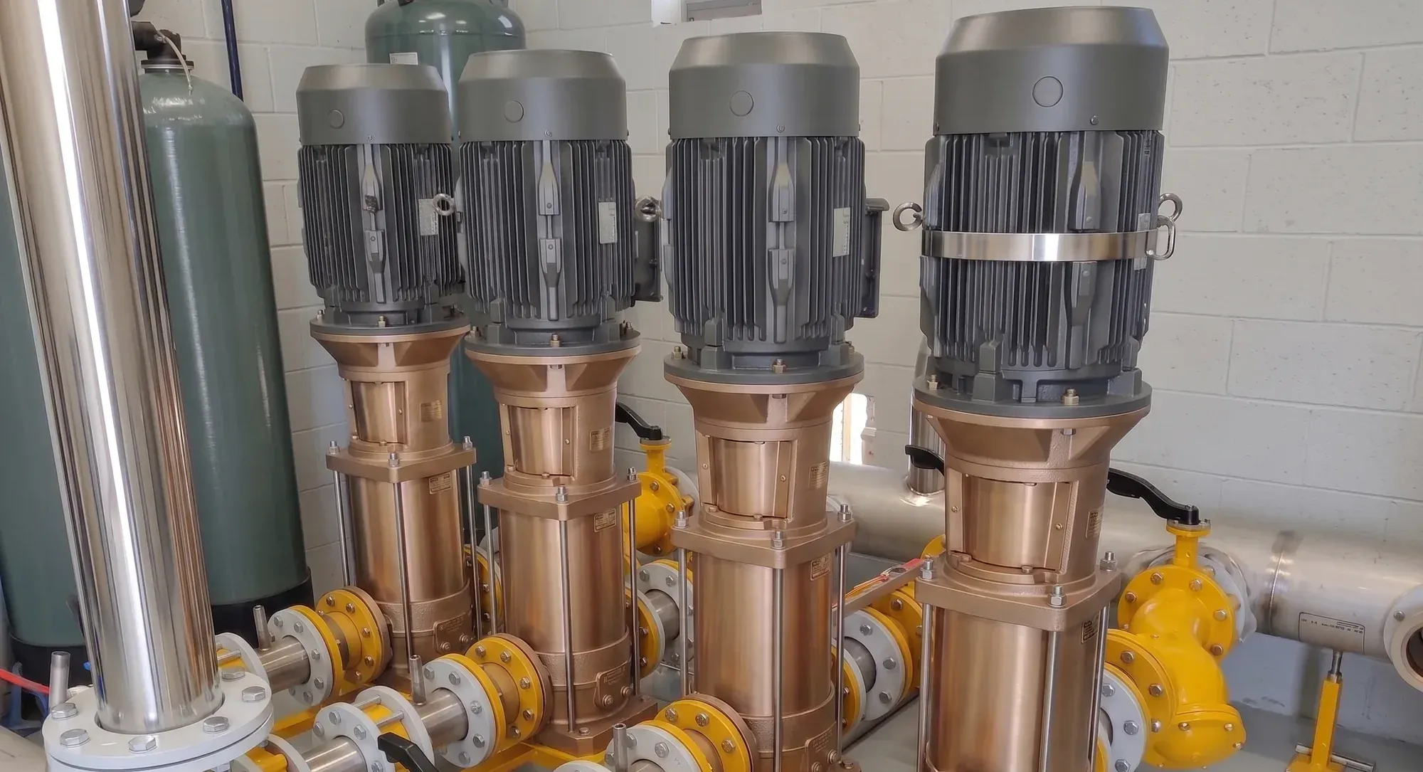 Four vertical multistage pumps on a common manifold, in the field